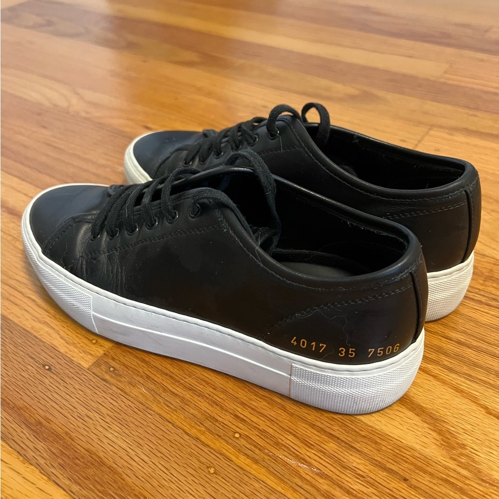 COMMON PROJECTS Black Tournament Super Low Sneakers
